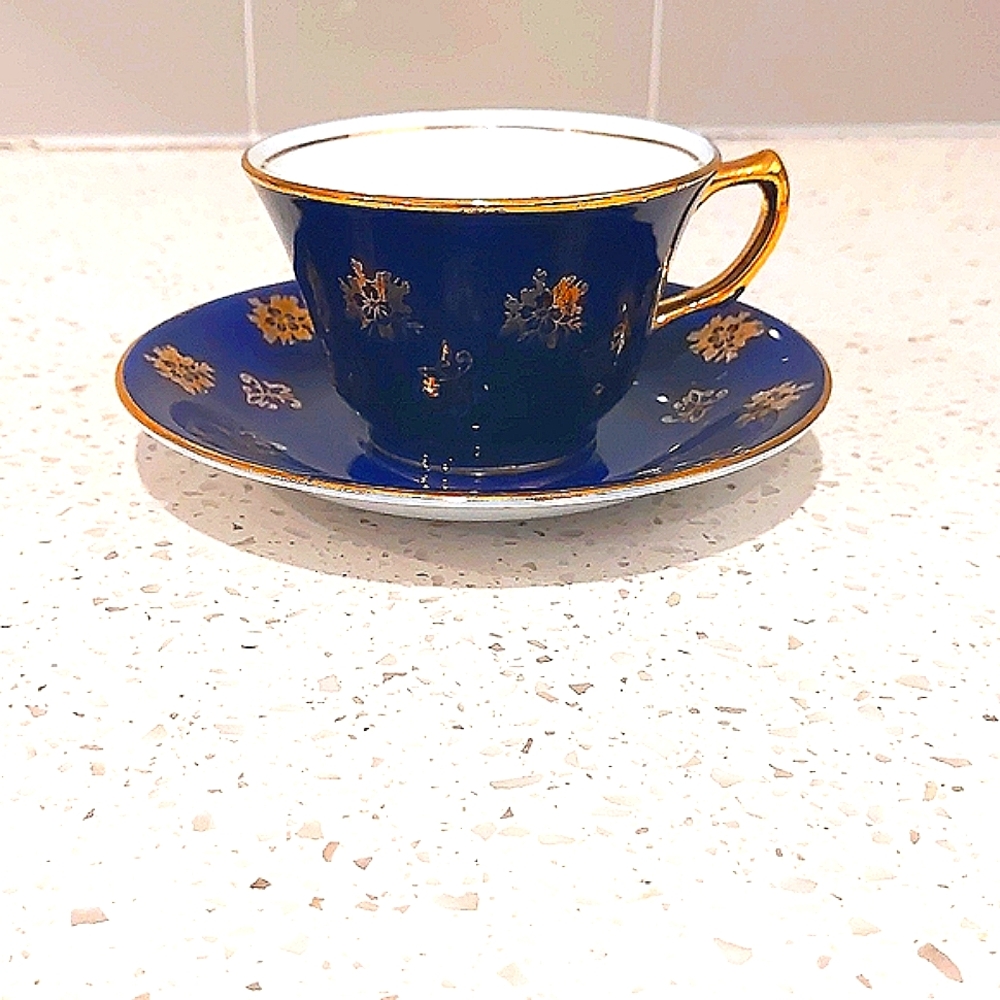 Spencer Stevenson Blue and Gold Teacup and Saucer